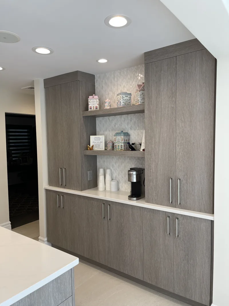 Custom coffee and beverage station with grey cabinetry